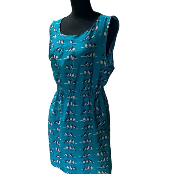 Uttman London sleeveless dress with a pattern of birds sitting on branches. - Picture 2 of 6